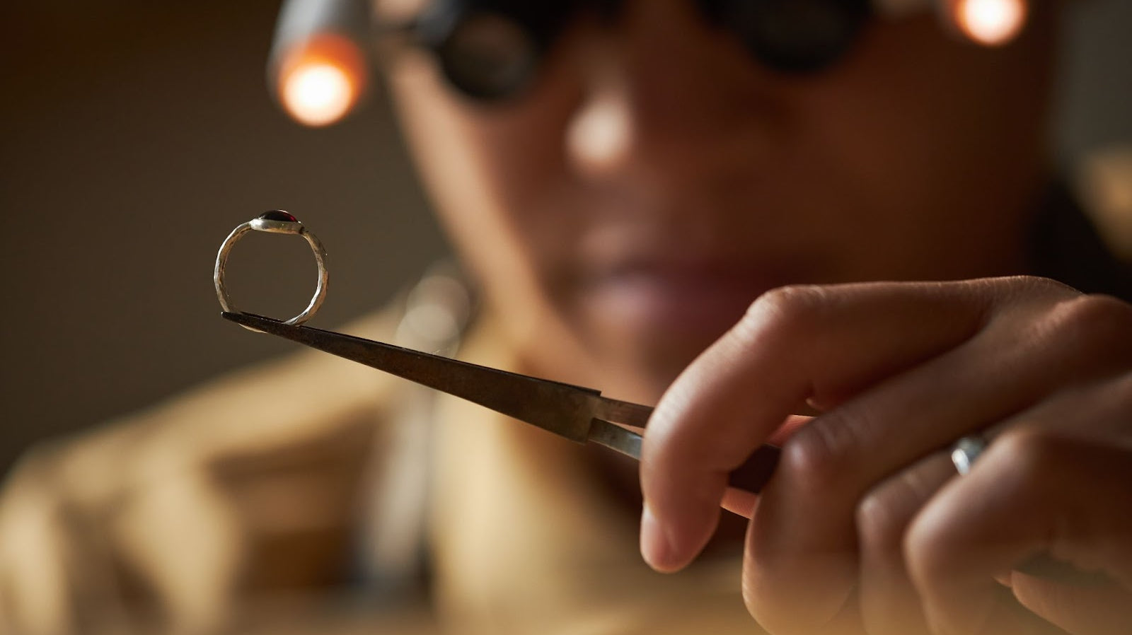 Close-up of a beautifully crafted custom engagement ring with intricate details, showcasing a unique design, symbolizing personalized luxury and craftsmanship
